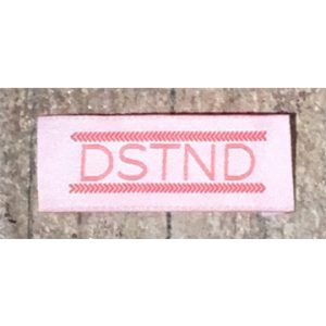 DSTND, garment labels